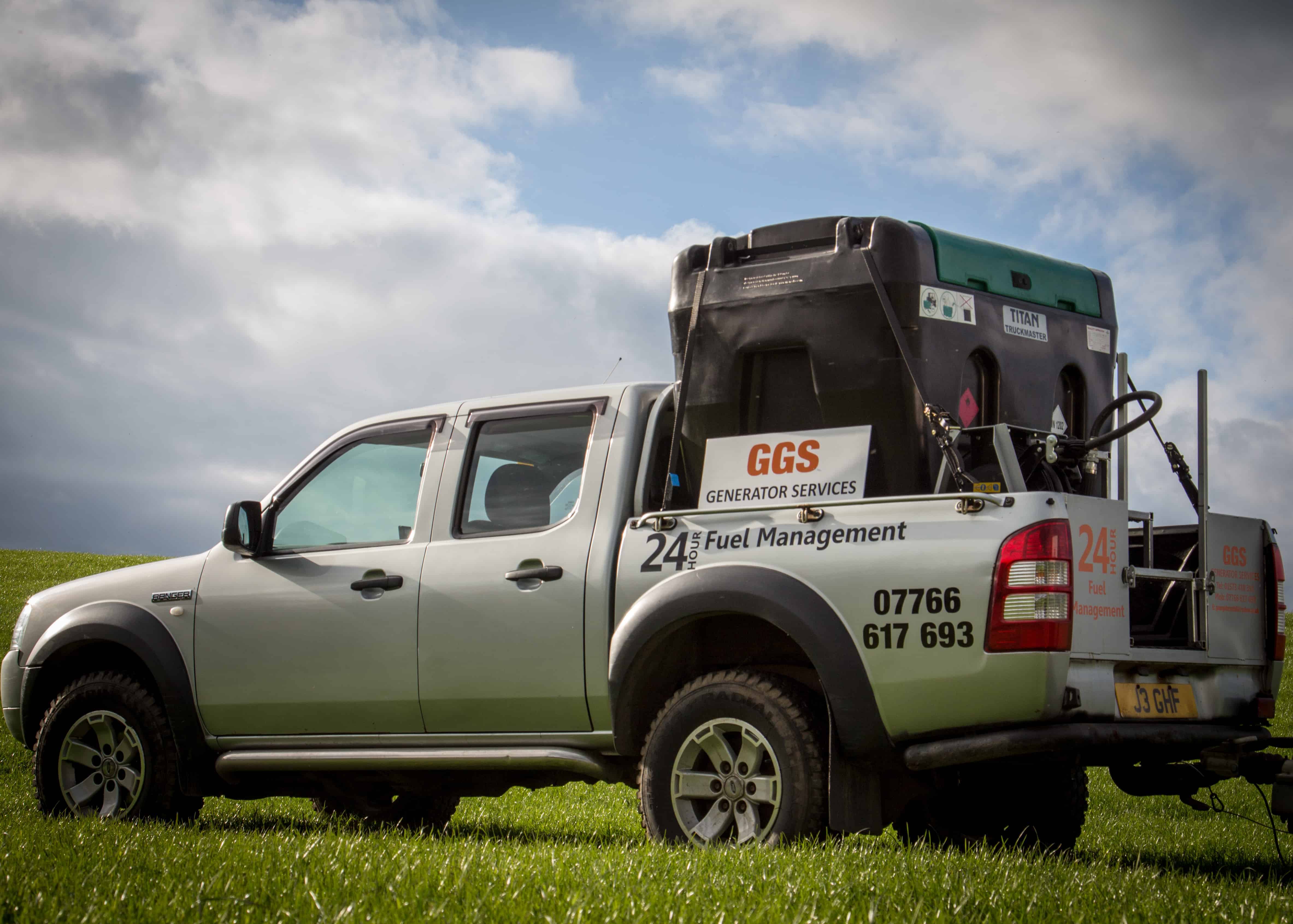 Generator hire Scotland van pulling a trailer